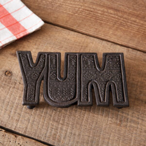 Yum Cast Iron Trivet by CTW Home Collection