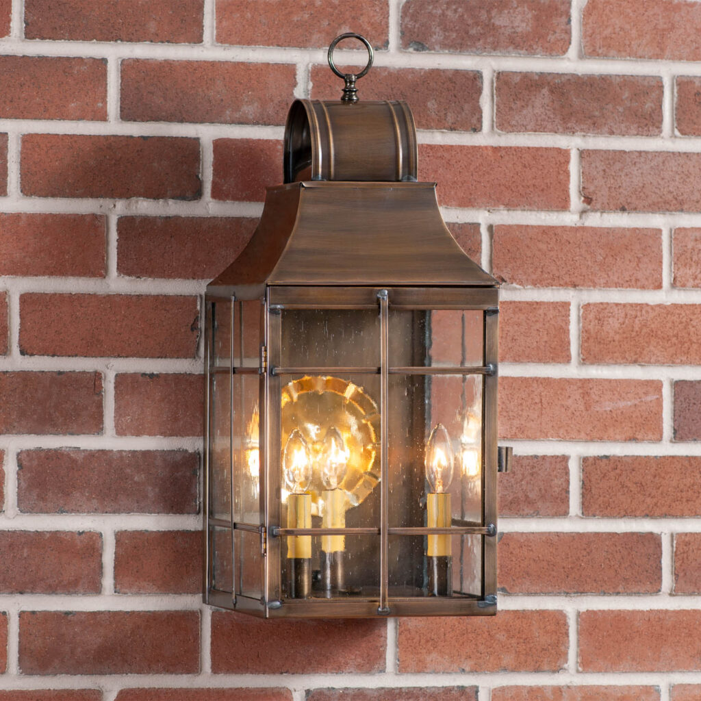 Antiqued Solid Brass Stenton Outdoor Wall Light in Solid Weathered Brass - 3 Light Outdoor Lights